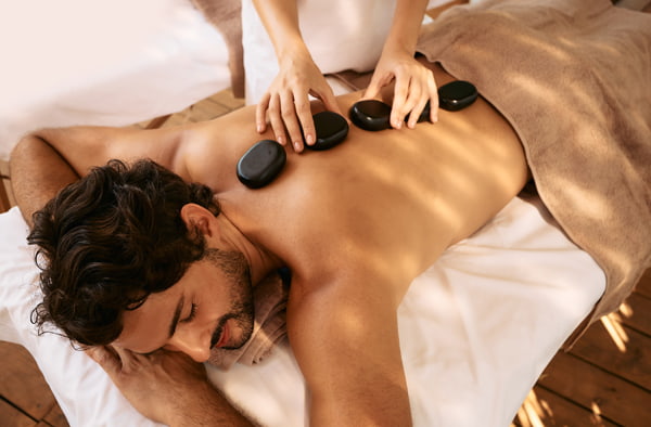 Hot stone massage promotes deep relaxation and improves sleep quality